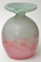 Lot 147 - Vasart: a pink and green swirl pattern table...