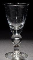 Lot 236 - A heavy baluster goblet, the large round...
