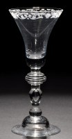Lot 243 - A light baluster goblet, the bell bowl...