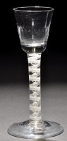 Lot 265 - A cordial glass, the round funnel bowl with...