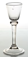 Lot 303 - Balustroid wine glass, round funnel bowl above...