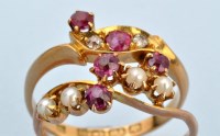 Lot 682 - An early 20th Centruy ruby and diamond ring,...