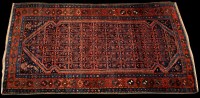 Lot 870 - An early 20th Century Luri rug, with repeated...