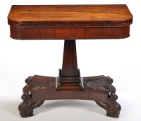 Lot 939 - A Regency rosewood swivel turn-over-top card...