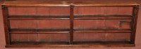 Lot 1084 - A 19th Century long mahogany open bookcase,...