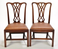 Lot 1097 - Four George III mahogany dining chairs, each...