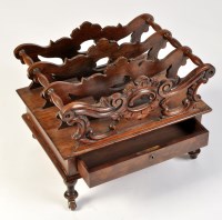 Lot 1106 - A Regency rosewood canterbury, the three...