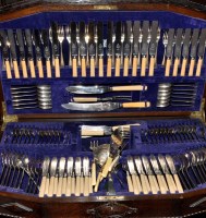 Lot 521 - A near complete service of flatware and...