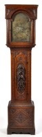Lot 1017 - William Gowland, Sunderland: a carved oak...