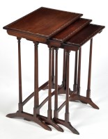 Lot 1065 - A nest of three graduated Regency style...