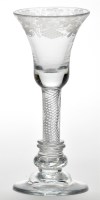 Lot 22 - Engraved air-twist wine glass, the bell bowl...