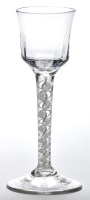 Lot 27 - A mixed twist wine glass, the waisted ogee...