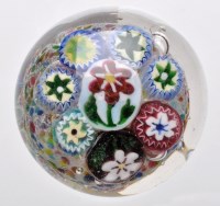 Lot 55 - Stemmed flowerhead and cog wheel cane...