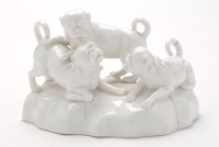 Lot 134 - Continental Whiteware model of three pug dogs...