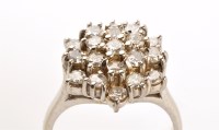 Lot 764 - A diamond cluster ring, the three-tier cluster...