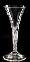 Lot 964 - Drawn air-twist wine glass, the trumpet bowl...