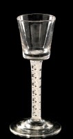 Lot 975 - Opaque twist wine glass, the bucket bowl above...