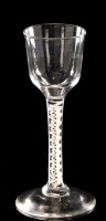 Lot 976 - Opaque twist wine glass, the ogee bowl above...