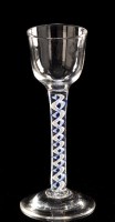 Lot 980 - Colour twist wine glass, the ogee bowl above...