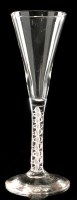 Lot 1003 - Mixed twist wine flute, the trumpet bowl above...
