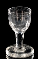 Lot 1014 - Faceted stem firing glass, the ogee bowl with...