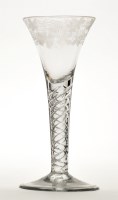 Lot 1031 - Engraved air-twist wine glass, the trumpet...