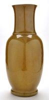 Lot 1210 - Chinese olive-brown glaze vase, of elongated...