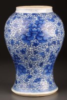 Lot 1026 - A blue and white vase, of baluster form...