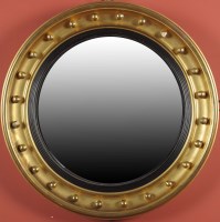 Lot 1236 - A Regency circular giltwood convex wall mirror,...