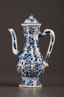 Lot 13 - An 18th Century blue and white ewer, Kangxi...