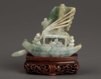 Lot 60 - A Jade model of a boat, 20th Century, raised...