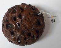 Lot 61 - A hardwood carving depicting two dragons...