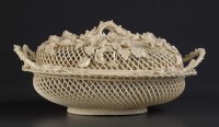 Lot 123 - Belleek: an oval covered three strand basket,...