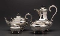 Lot 706 - An Edwardian four piece tea service, by James...