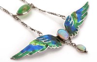 Lot 890 - An Art Nouveau enamel and opal pendant, cica...