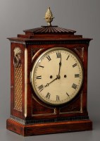 Lot 1276 - A Regency rosewood and brass inlaid bracket...