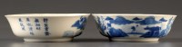 Lot 504 - Two blue and white bowls, each painted with a...