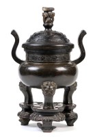 Lot 532 - A large bronze tripod censer, in archaistic...
