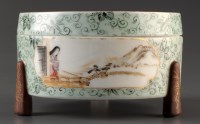 Lot 536 - A circular box with tripod feet, the cover...
