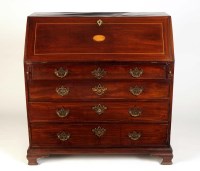 Lot 1055 - A George III mahogany bureau, the rectangular...