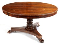 Lot 1180 - A Regency rosewood circular-shaped tip-up-top...