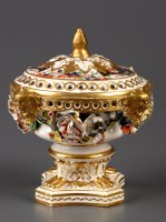 Lot 309 - A Bloor Derby pot-pourri vase, raised on paw...