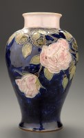 Lot 327 - Royal Doulton, Lambeth, a baluster form vase...