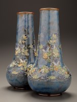 Lot 350 - Royal Doulton: a pair of vases of inverted...
