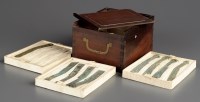 Lot 435 - A Chinese 19th Century hardwood box containing...