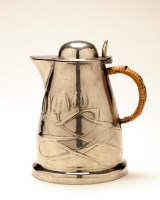 Lot 473 - A Liberty pewter jug, with domed cover, rush...
