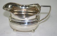 Lot 485 - A George V cream jug, by Northern Goldsmiths...