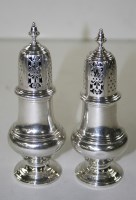 Lot 491 - A pair of George V casters, by William Comyns...