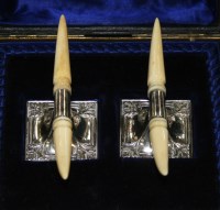 Lot 598 - A pair of Edwardian silver and ivory knife...