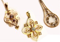 Lot 775 - Three Edwardian pendants, to include: an...